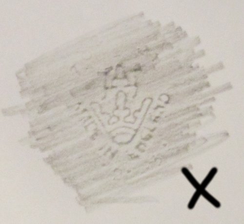 JAJ crown backstamp with a cross next to it